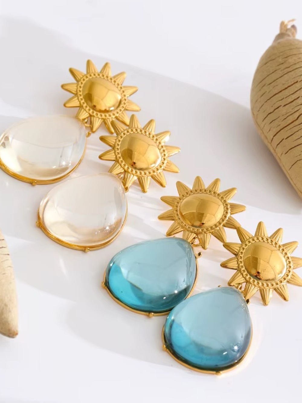 Gold Sun Drop Earrings with Blue and Clear Teardrops